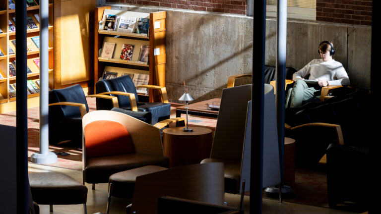 A student reading in the library