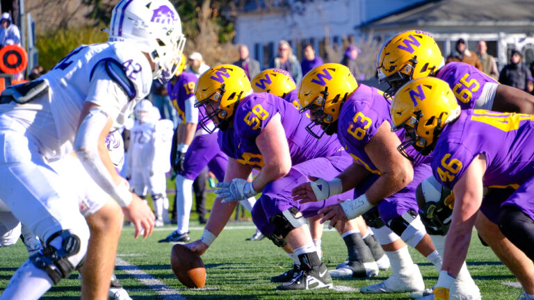 The Williams College Football Team at the line of scrimmage against the Amherst College Football Team