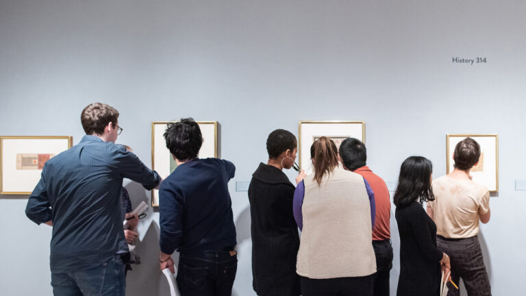 History 314 students examining pieces in the Williams College Museum of Art Object Lab