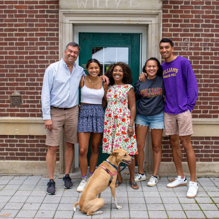 Photo of family in front of dorm