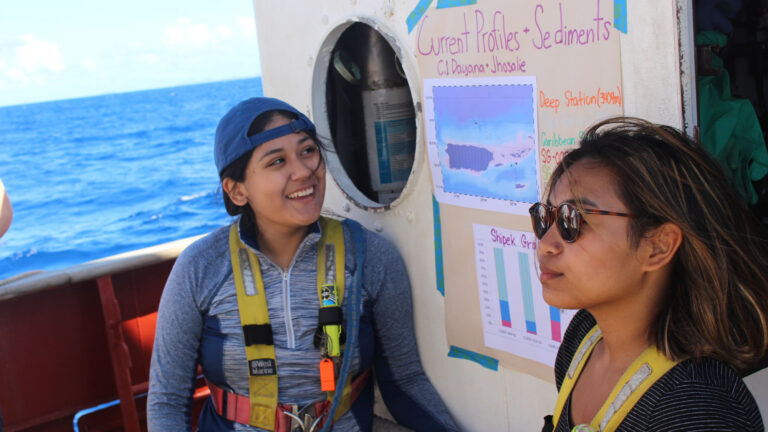 Students on a boat during the CaOS Climate and Community Leaders program