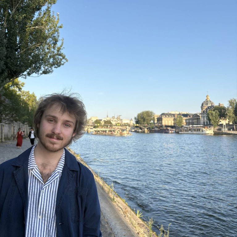 Noah Robie ’26 by the Seine River