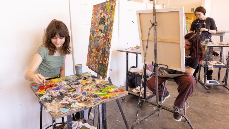 Art students at their easels