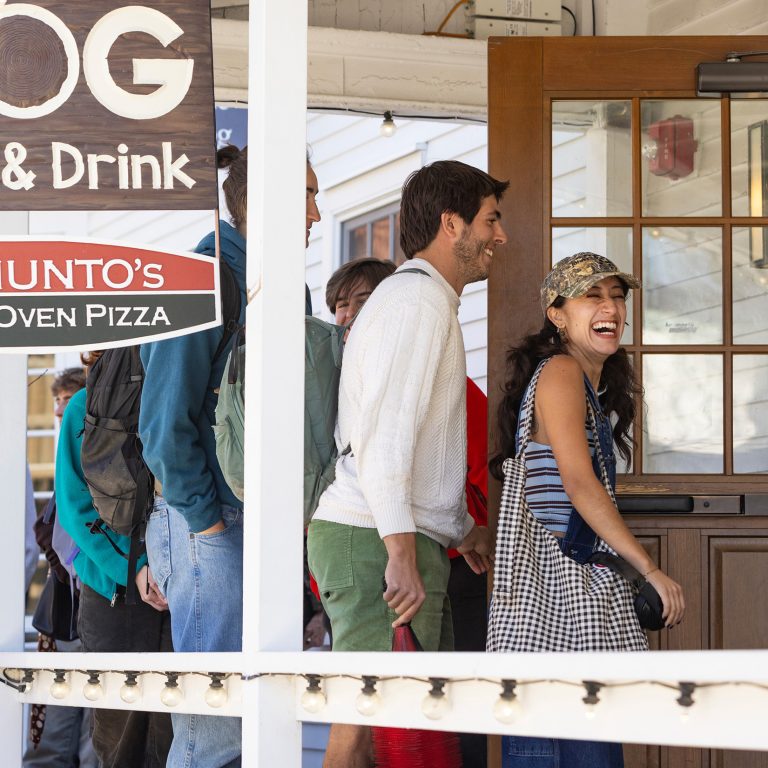 Students walking into Remuntos pizzeria on Spring Street