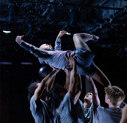 Group of dancers hoisting another dancer into the air, cover photo for Visiting Artist: kNoname Artist / Roderick George, Open Rehearsal