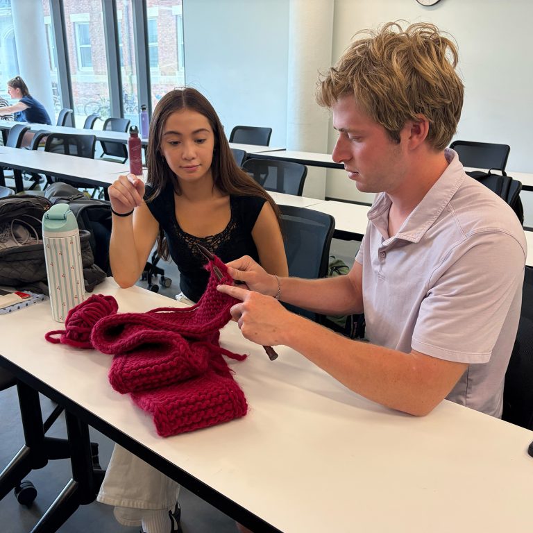 Students working on a knitting project in a Program in Teaching course